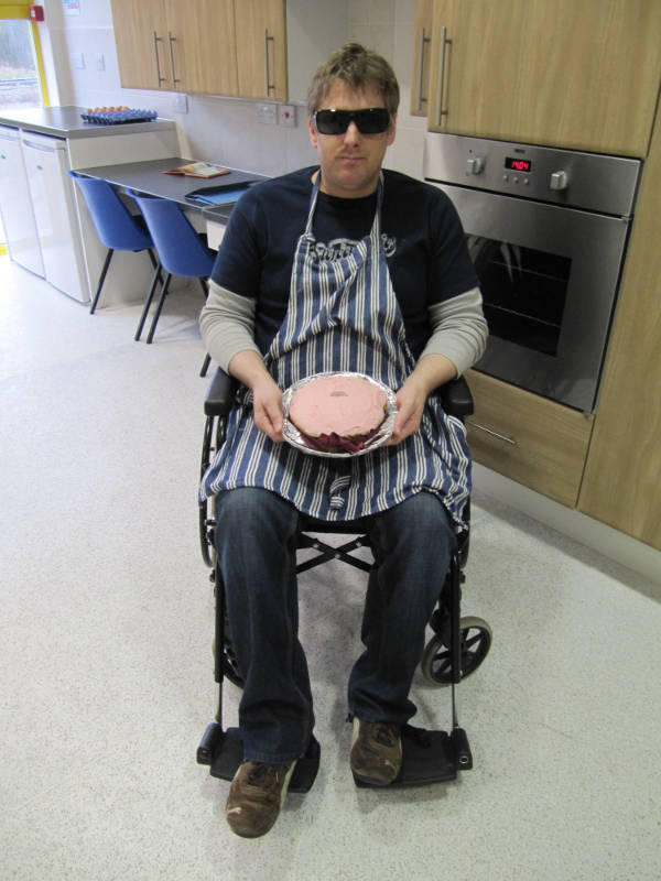 Daniel Reeves cooking at Headway Gloucestershire